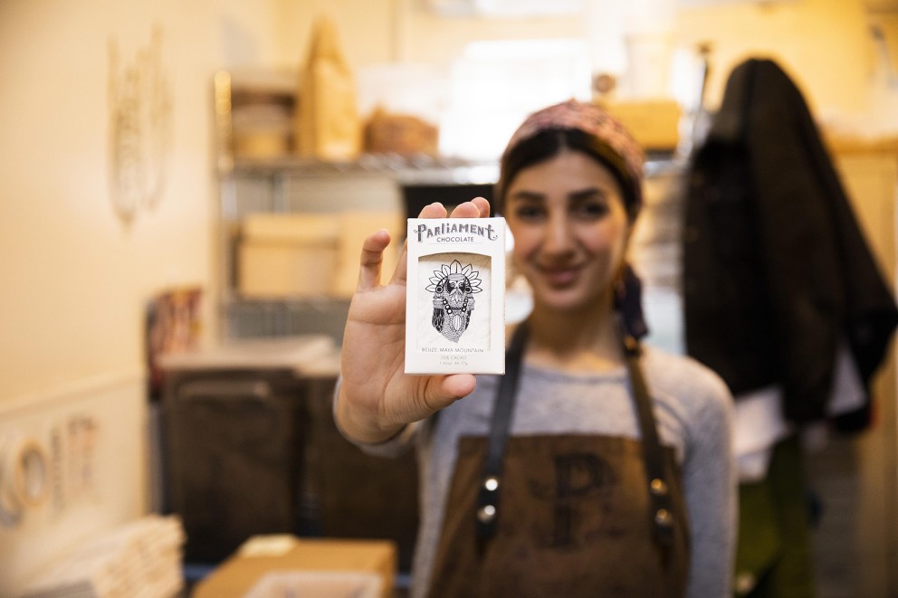 woman holding Parliament Chocolate box